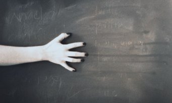 Why does scratching a chalkboard make you cringe?